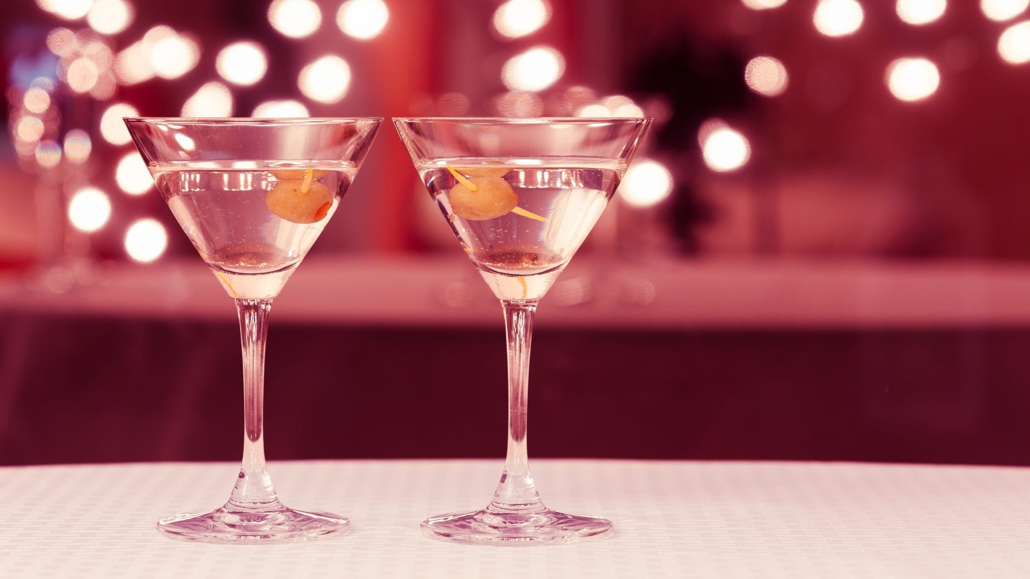 Martini glasses in a bar setting